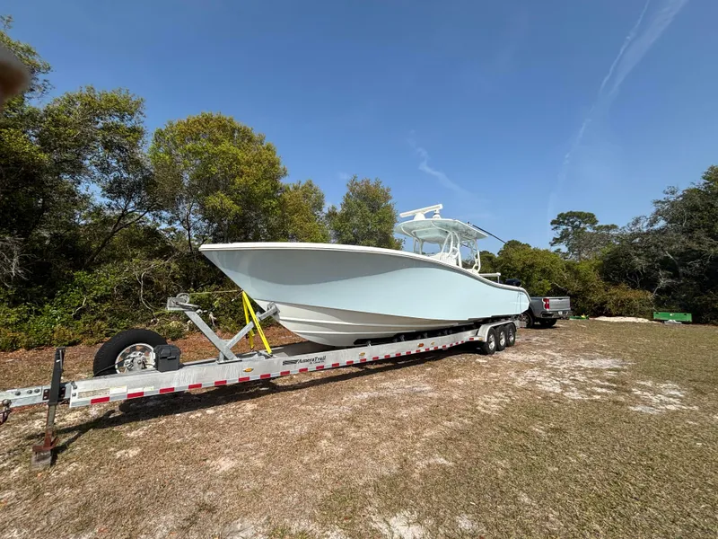 Slide: The Image of Yellowfin Boats, Contender Boats, SeaVee Boats, Regulator Boats, SeaHunter Boats, Invincible Boats, Pair Marine, Southport, REV Yacht Sales - 1