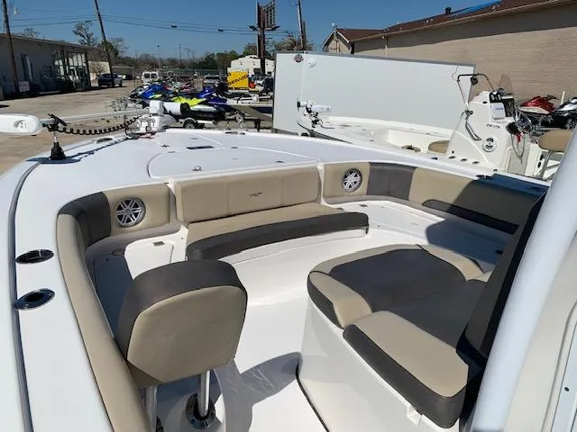 Slide: The Image of 2019 Tidewater 2700 Carolina Custom Bay boat interior with seating and speakers. - 5