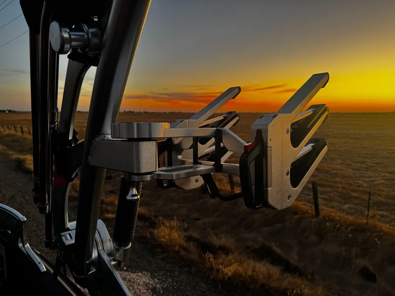 Slide: The Image of 2018 MasterCraft XStar wakeboard rack at sunset, showcasing sleek design and functionality. - 13
