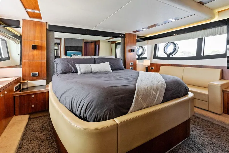 Slide: The Image of Luxurious bedroom interior of 2011 Sunseeker 64 Predator yacht with modern furnishings. - 16
