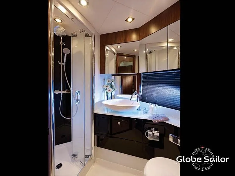 Slide: The Image of Luxurious bathroom interior of 2011 Sunseeker 64 Predator yacht with modern fixtures. - 17