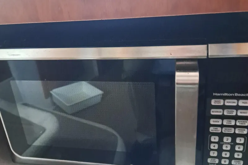 Slide: The Image of Microwave in 1999 Cruisers aft cabin kitchen area. - 4