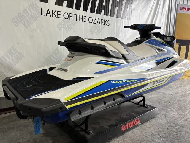 Slide: The Image of 2019 Yamaha WaveRunner VXR jet ski displayed indoors on a stand. - 3