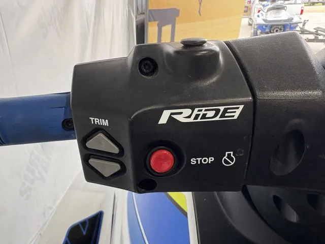 Slide: The Image of 2019 Yamaha WaveRunner VXR handlebar controls with trim and stop buttons. - 6