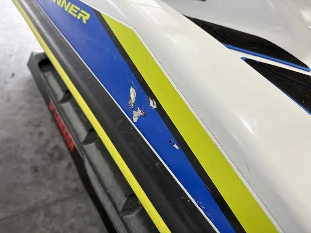 Slide: The Image of 2019 Yamaha WaveRunner VXR with minor scratches on blue and yellow trim. - 9