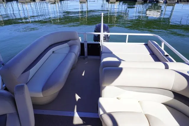 Slide: The Image of 2014 Sun Tracker Party Barge 24 XP3 pontoon boat with spacious seating on calm water. - 8