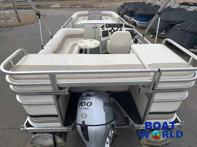 Slide: The Image of 2000 Weeres Sundeck 280 TT pontoon boat with 2021 Honda 100HP engine, rear view. - 10