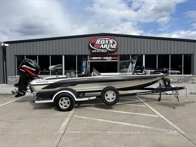 Slide: The Image of 2001 Ranger 518VX boat with Mercury engine at Ned's Marine dealership. - 1