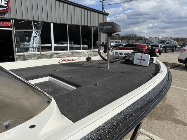 Slide: The Image of 2001 Ranger 518VX boat with Lowrance equipment, parked outside a dealership. - 6