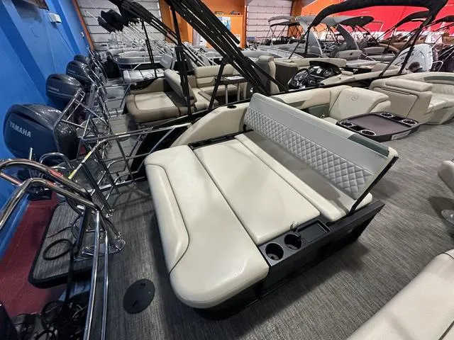 Slide: The Image of 2025 Godfrey Sweetwater 2286 SFL pontoon boat interior with plush seating and modern design. - 11