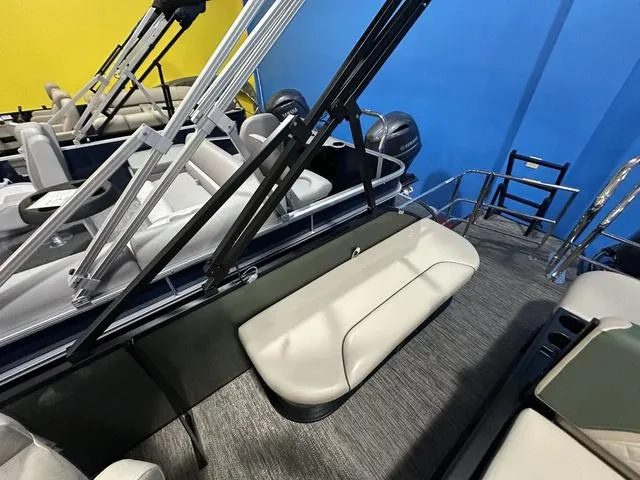 Slide: The Image of 2025 Godfrey Pontoons Sweetwater 2286 SFL Sport Tube interior with seating and railing. - 13