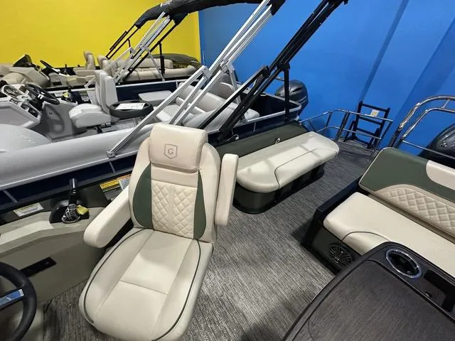Slide: The Image of 2025 Godfrey Pontoons Sweetwater 2286 SFL Sport Tube interior with luxurious seating and modern design. - 15