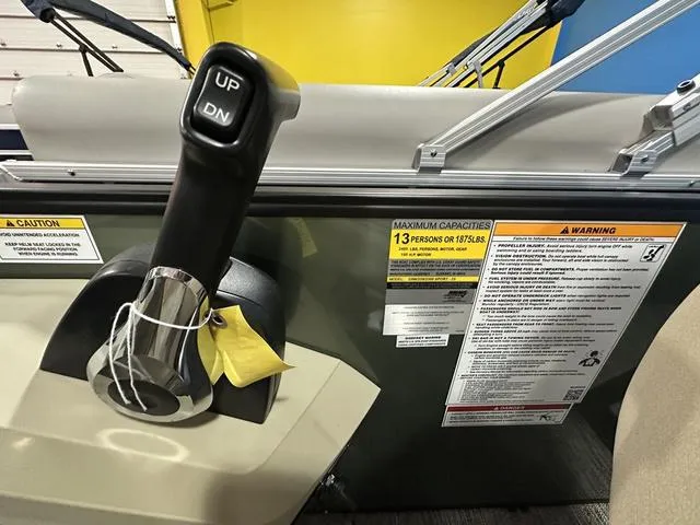 Slide: The Image of 2025 Godfrey Pontoons Sweetwater 2286 SFL control panel with capacity and warning labels. - 17