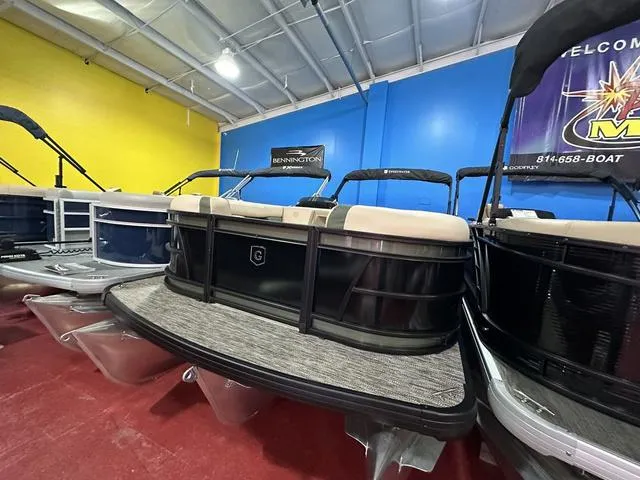 Slide: The Image of 2025 Godfrey Pontoons Sweetwater 2286 SFL Sport Tube on display in showroom. - 3