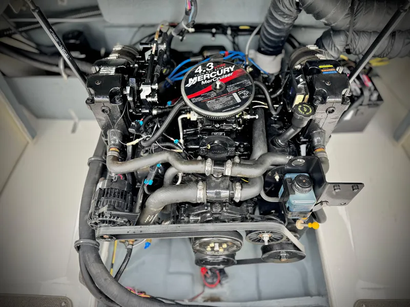 Slide: The Image of 2005 Maxum 1800 SR3 boat engine, featuring a 4.3 Mercury motor. - 15