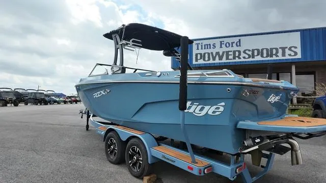 Slide: The Image of 2021 Tigé RZX Class 22 RZX boat on trailer at Tims Ford Powersports. - 22
