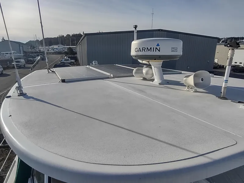 Slide: The Image of Rooftop view of 2002 Endeavour Trawlercat 36 with Garmin radar and solar panels. - 28