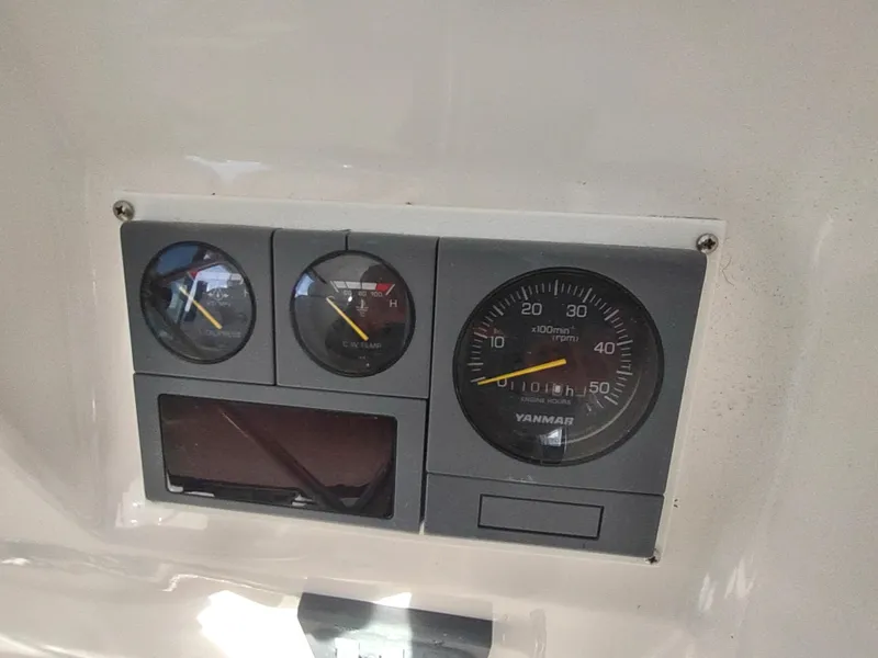 Slide: The Image of Instrument panel of 2002 Endeavour Trawlercat 36 with gauges and dials. - 40