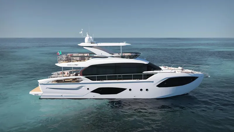 Slide: The Image of Luxurious 2026 Absolute 70' Fly yacht cruising on serene blue waters. - 1