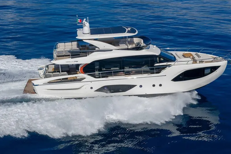 The Image of 2026 Absolute 70' Fly yacht cruising on open blue sea. - 0