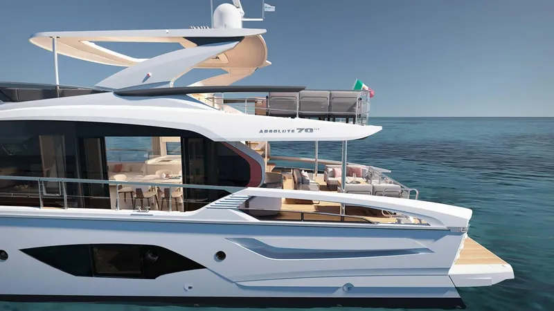 Slide: The Image of 2026 Absolute 70' Fly yacht cruising on open sea with scenic coastal backdrop. - 2
