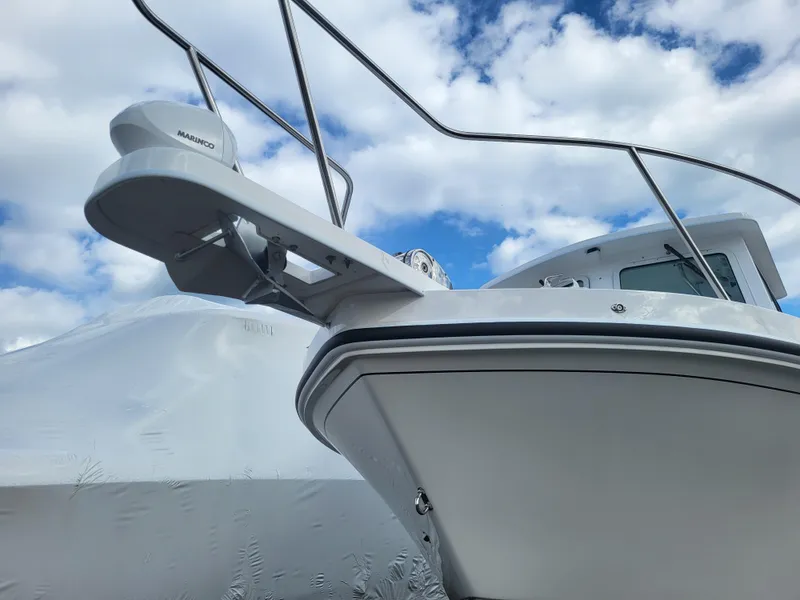 Slide: The Image of 2025 Steiger Craft 255 DV MIAMI boat with clear sky background. - 12