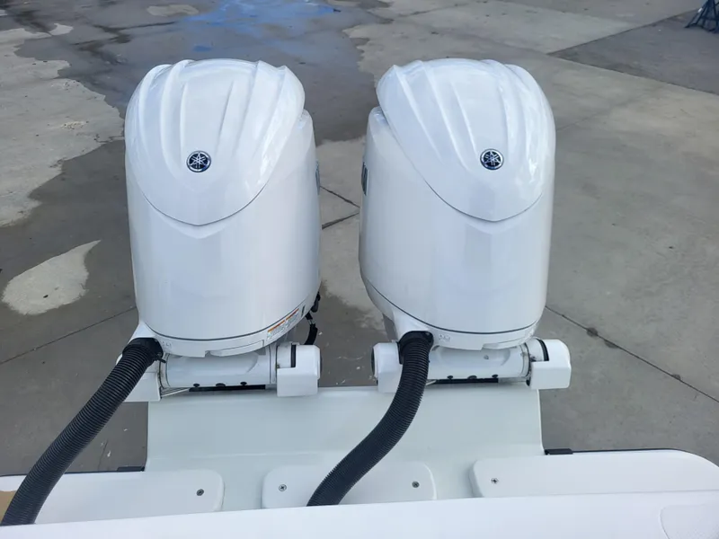 Slide: The Image of Twin outboard engines on a 2025 Steiger Craft 255 DV MIAMI boat. - 22