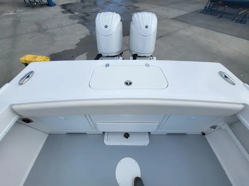 Slide: The Image of 2025 Steiger Craft 255 DV MIAMI boat with dual engines, viewed from the deck. - 37