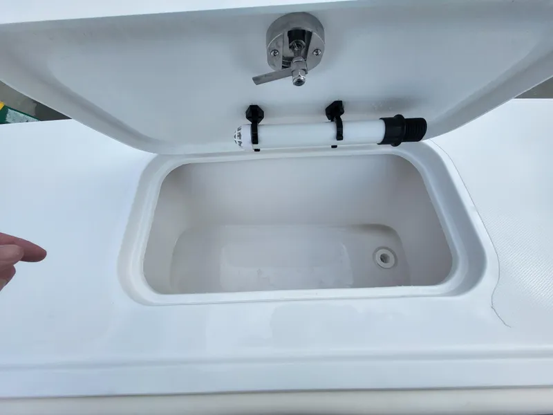 Slide: The Image of 2025 Steiger Craft 255 DV MIAMI boat storage compartment with open lid. - 38