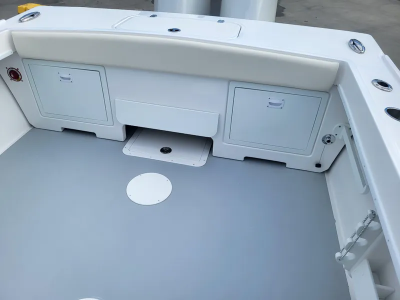 Slide: The Image of 2025 Steiger Craft 255 DV MIAMI boat deck with storage compartments. - 39