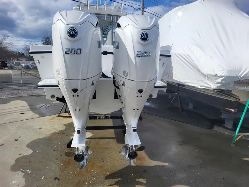Slide: The Image of Twin Yamaha outboard engines on a 2025 Steiger Craft 255 DV MIAMI boat. - 7