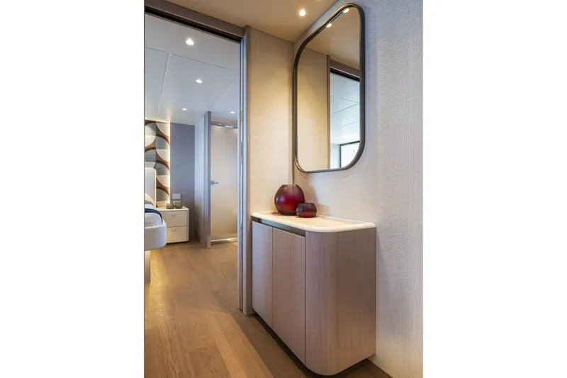 Slide: The Image of Luxurious interior of 2026 Absolute 62' Navetta yacht with modern decor and elegant furnishings. - 29