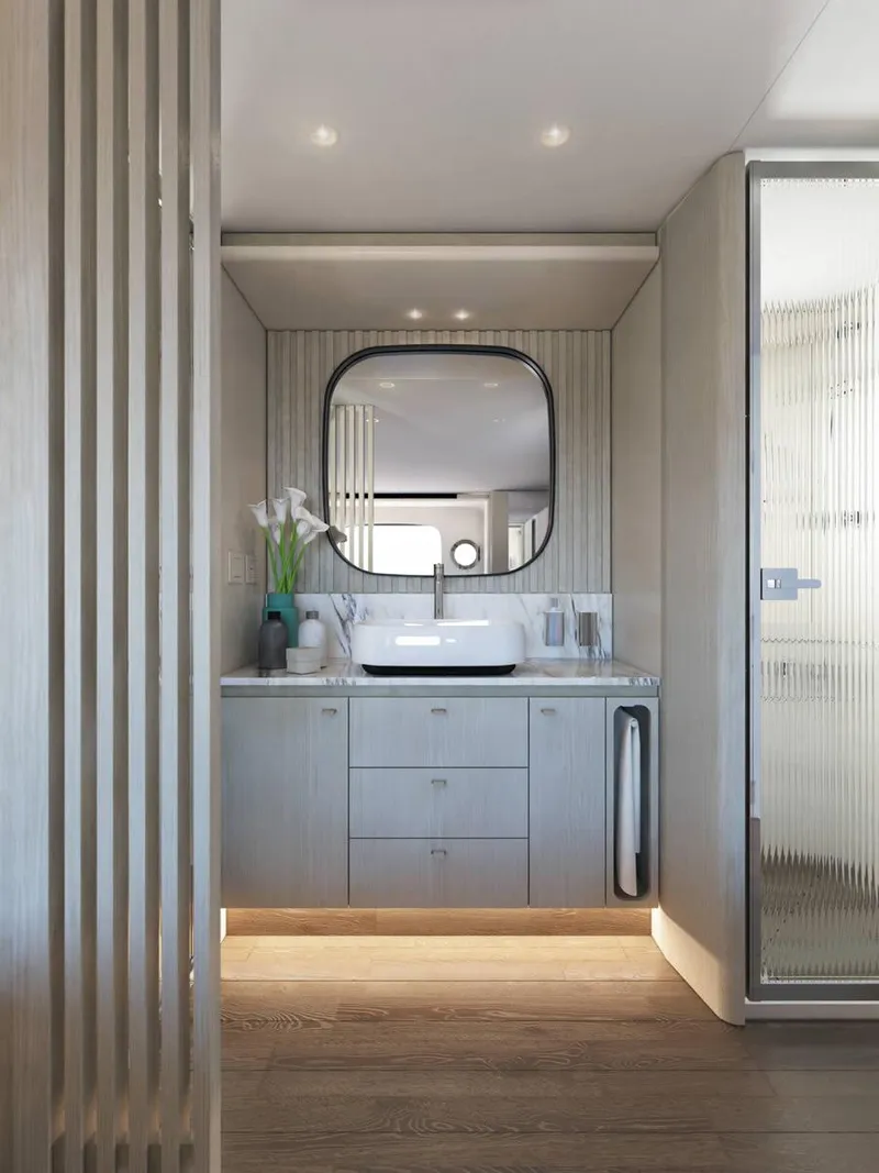 Slide: The Image of Interior view of 2026 Absolute 62' Navetta yacht helm with scenic ocean backdrop. - 20