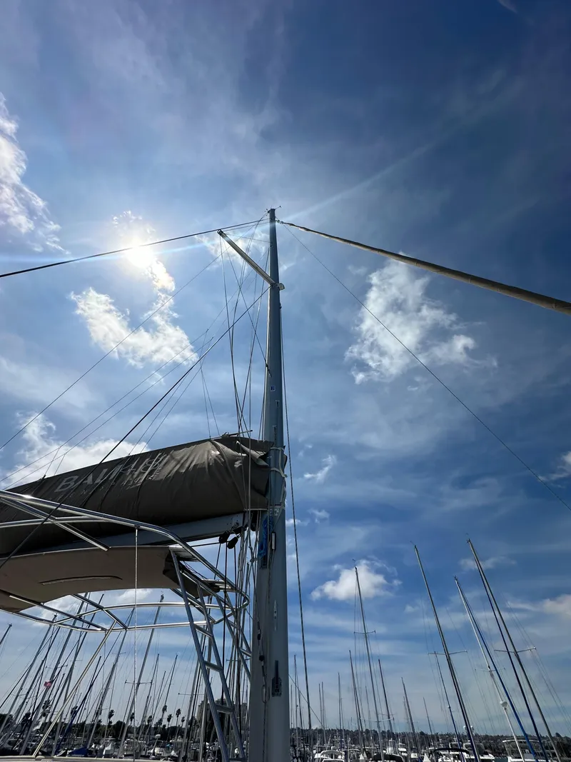 Slide: The Image of Sailboat mast under a bright blue sky, Bali 4.8 model, 2021. - 10