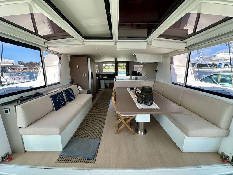 Slide: The Image of Luxurious interior of a 2021 Bali 4.8 catamaran with spacious seating and dining area. - 30