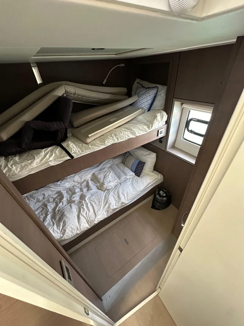 Slide: The Image of Interior of 2021 Bali 4.8 yacht with bunk beds and window. - 44