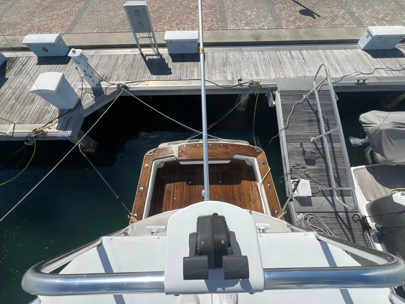 Slide: The Image of Aerial view of a 1997 Strike 42 boat docked at a marina. - 39