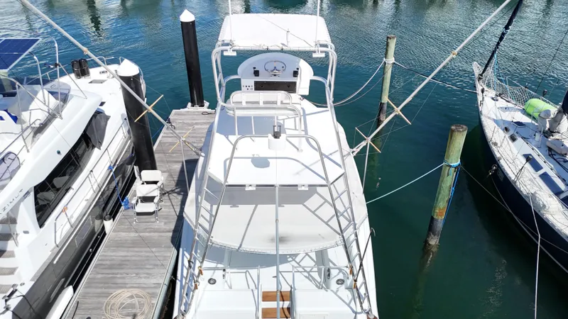 Slide: The Image of Aerial view of a 1997 Strike 42 boat docked at a marina. - 8