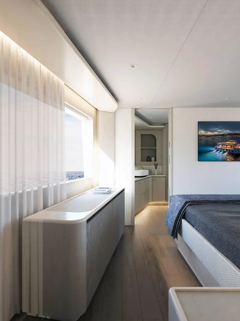 Slide: The Image of Luxurious interior of 2026 Absolute 62' Navetta yacht with panoramic windows and elegant furnishings. - 15