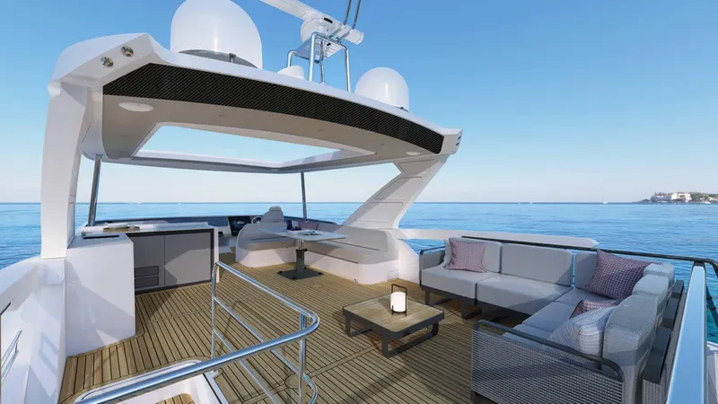 Slide: The Image of 2026 Absolute 62' Navetta yacht cruising on open sea with scenic coastline. - 3