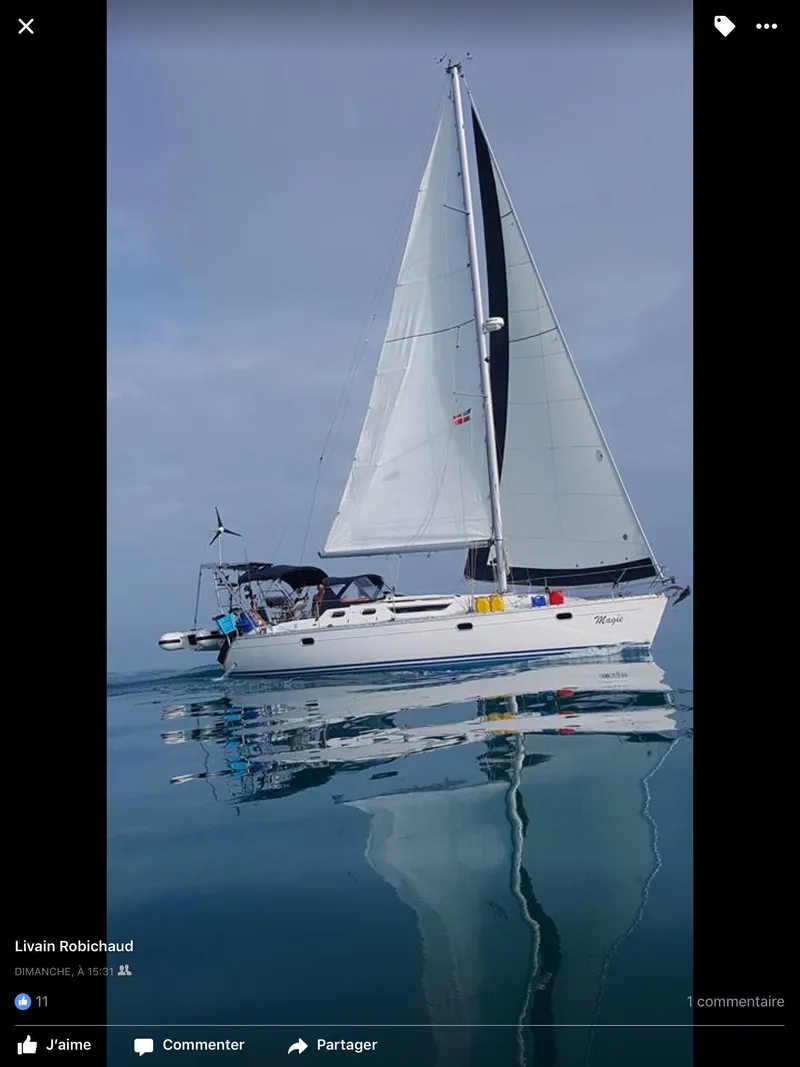 Slide: The Image of Sailing yacht Jeanneau Sun Odyssey 36.2, 1997 model, gliding on calm waters. - 3