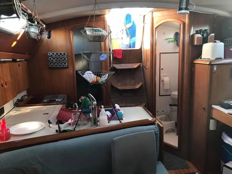 Slide: The Image of Interior of 1997 Jeanneau Sun Odyssey 36.2 sailboat with kitchen and bathroom. - 8