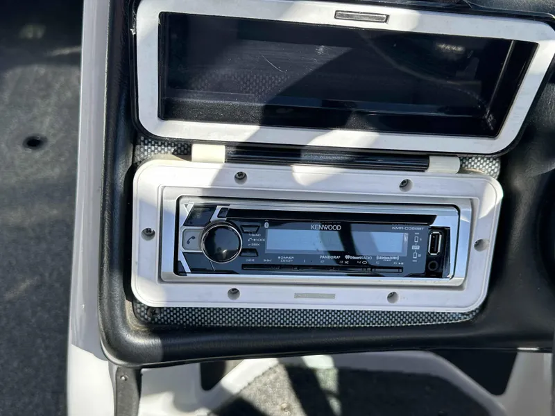 Slide: The Image of Kenwood stereo system in a 2007 Sanger V215 boat dashboard. - 22