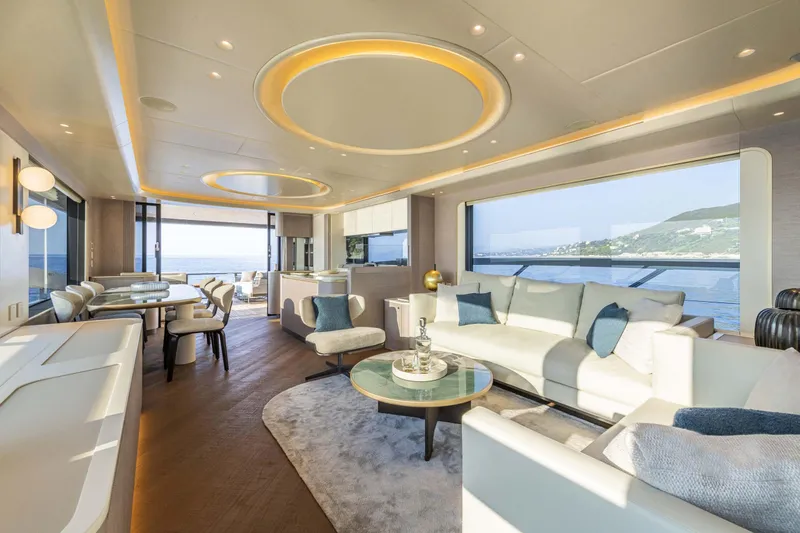 Slide: The Image of Luxurious interior of 2026 Absolute 70' Navetta yacht with elegant seating and ocean views. - 22