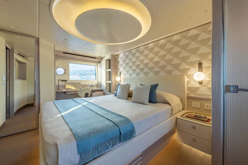 Slide: The Image of Luxurious bedroom interior on 2026 Absolute 70' Navetta yacht, featuring modern design and elegant decor. - 26