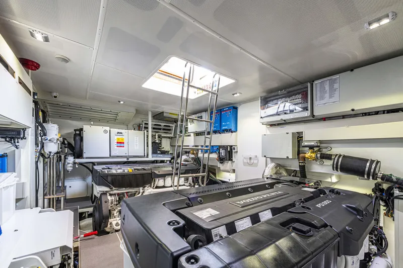 Slide: The Image of Engine room of 2026 Absolute 70' Navetta yacht, featuring advanced machinery and equipment. - 31