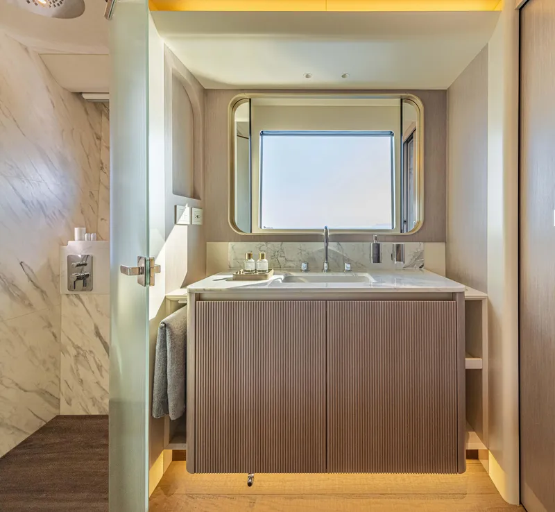 Slide: The Image of Luxurious bathroom interior on 2026 Absolute 70' Navetta yacht, featuring modern design and elegant fixtures. - 28
