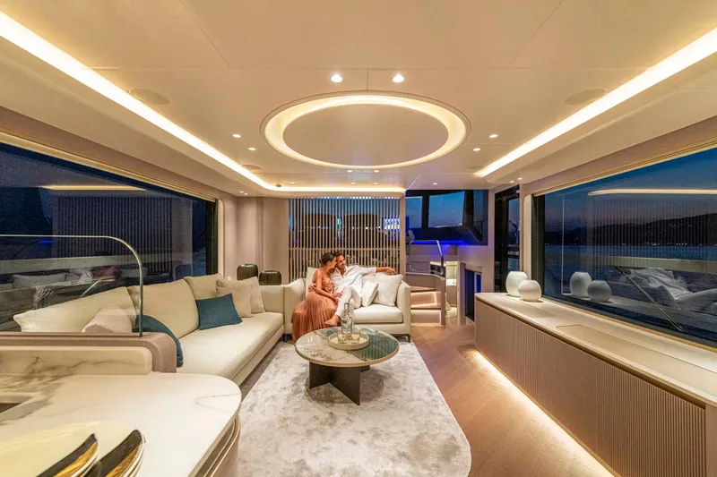 Slide: The Image of Luxurious interior of 2026 Absolute 70' Navetta yacht with elegant seating and ambient lighting. - 20