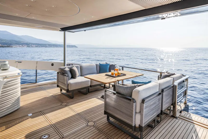 Slide: The Image of Luxurious deck of 2026 Absolute 70' Navetta yacht with ocean view. - 7