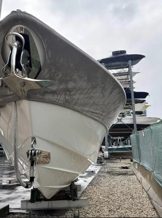 Slide: The Image of 2020 SeaVee 340Z boat in storage, showcasing sleek hull design. - 14